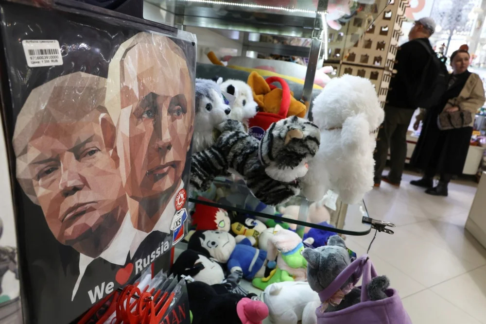 A t-shirt featuring portraits of Vladimir Putin and Donald Trump on display at a gift shop in Moscow, Russia, 16 May 2025. EPA/MAXIM SHIPENKOV