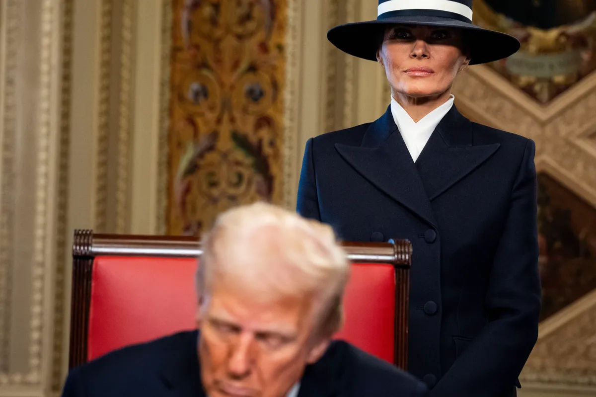 US President Donald Trump signs dozens of executive orders after being sworn in as the 47th president of the United States at the US Capitol in Washington, DC, as First Lady Melania Trump looks on, 20 January 2025. Photo: EPA / Melina Mara / POOL