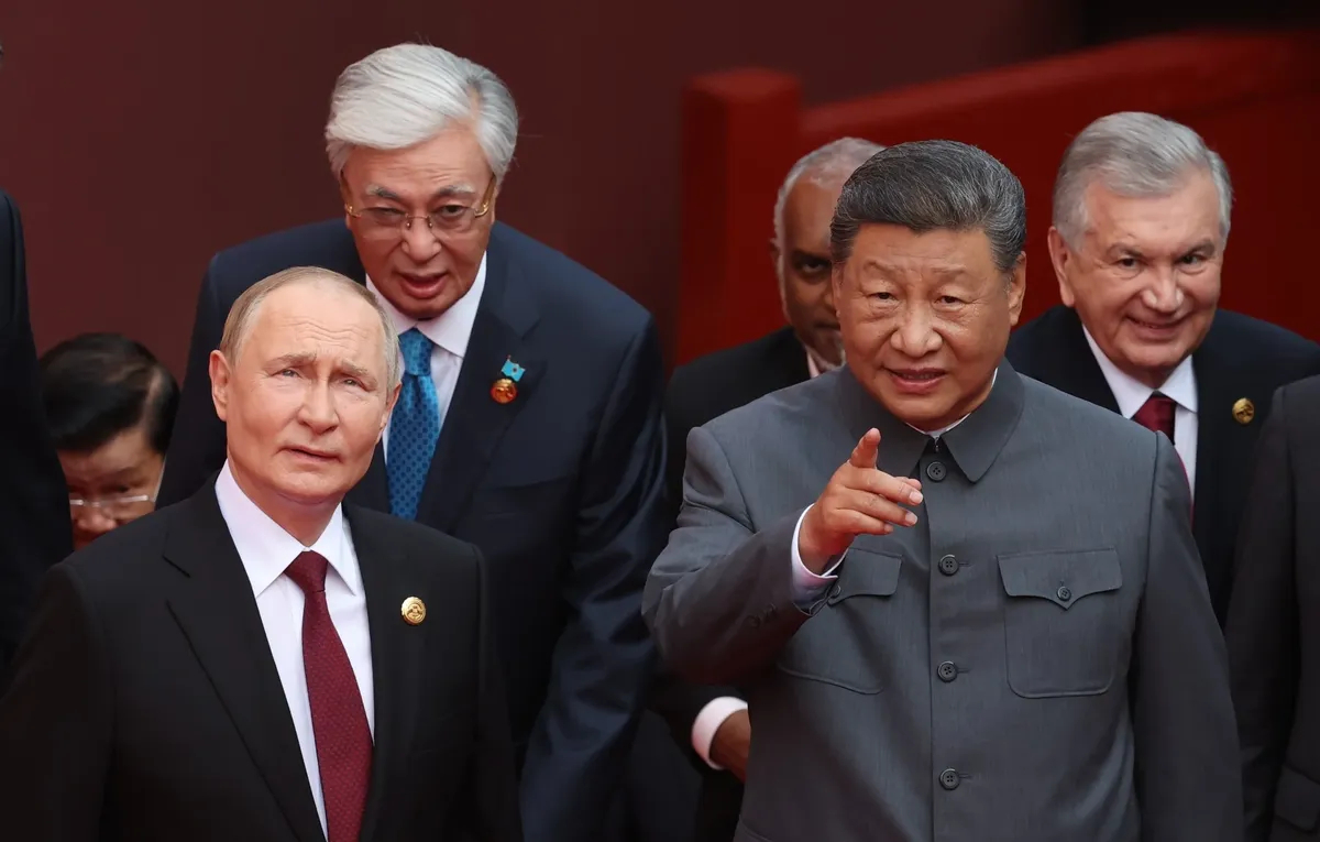 Putin and Chinese President Xi Jinping arrive to attend a military parade on Beijing’s Tiananmen Square in China, 3 September 2025. Photo: EPA / ALEXANDER KAZAKOV / SPUTNIK / KREMLIN