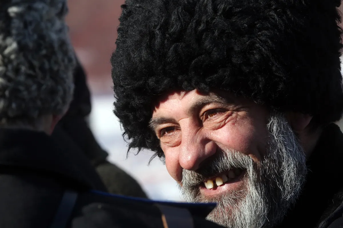 A Cossack man during celebrations for Maslenitsa, a Slavic holiday that dates back to pagan times marking the end of winter. Photo: EPA / ANATOLY MALTSEV